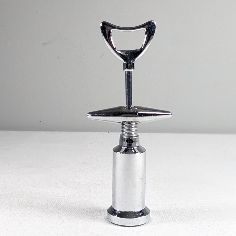 Vintage modernist Silver toned metal wine corkscrew and soda / beer bottle